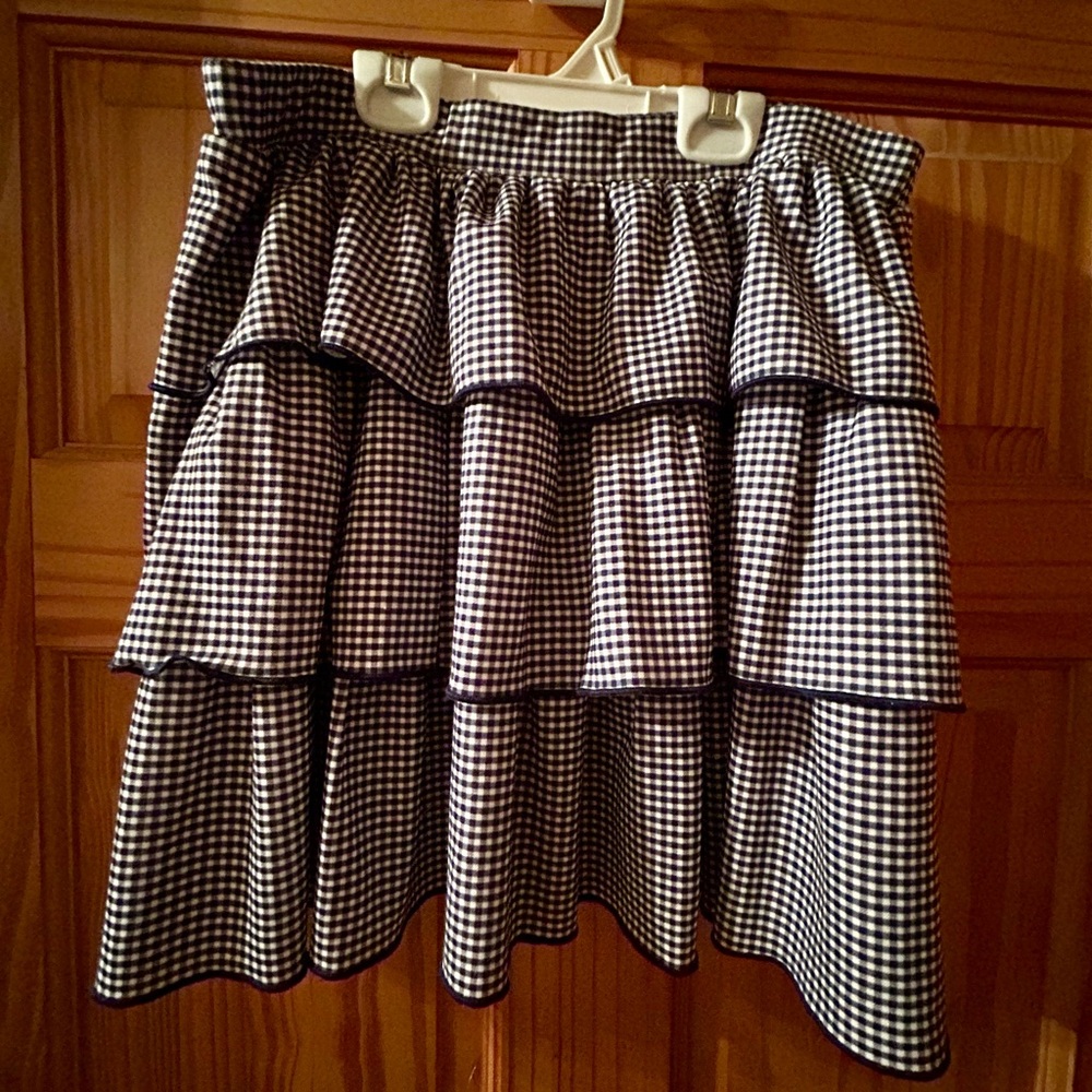 Blue and white ruffled look skirt for work or casual 
Never worn